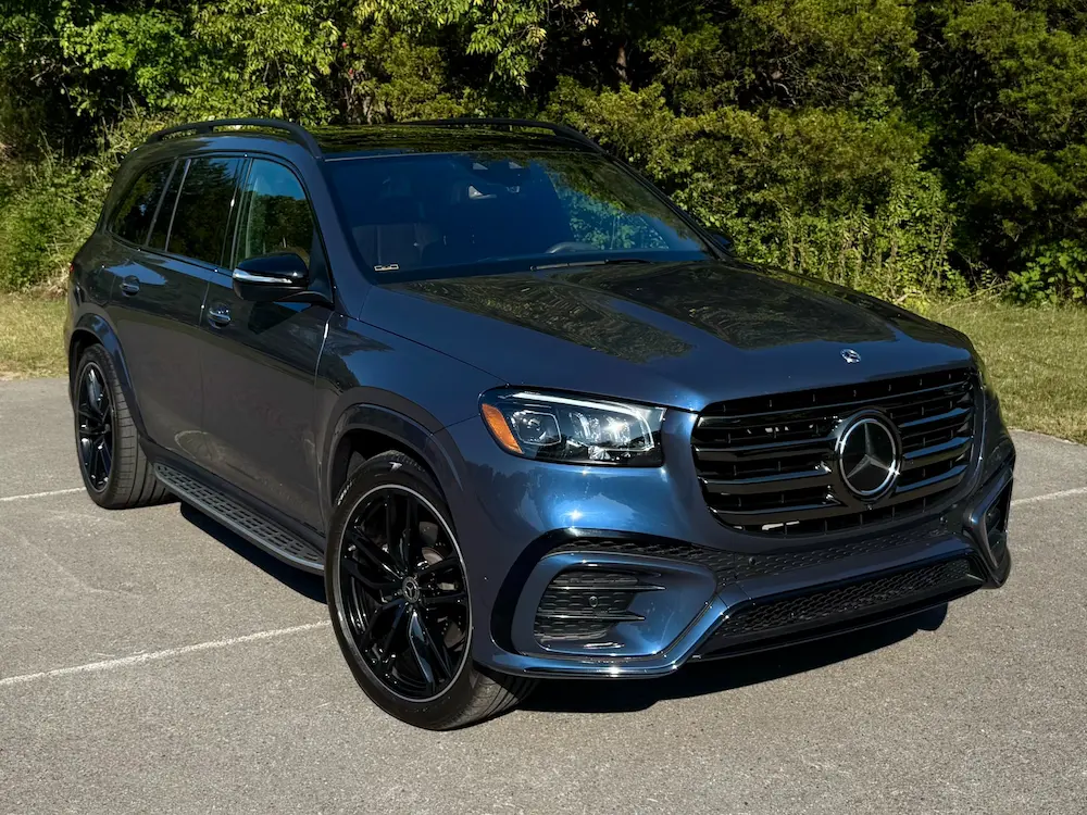 2024 Mercedes-Benz GLS 450 4MATIC in blue metallic with AMG Line exterior and black accents.