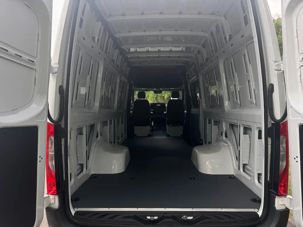 Rear interior cargo space of 2024 Mercedes-Benz Sprinter 3500 showing extended cargo bay and flat load floor.