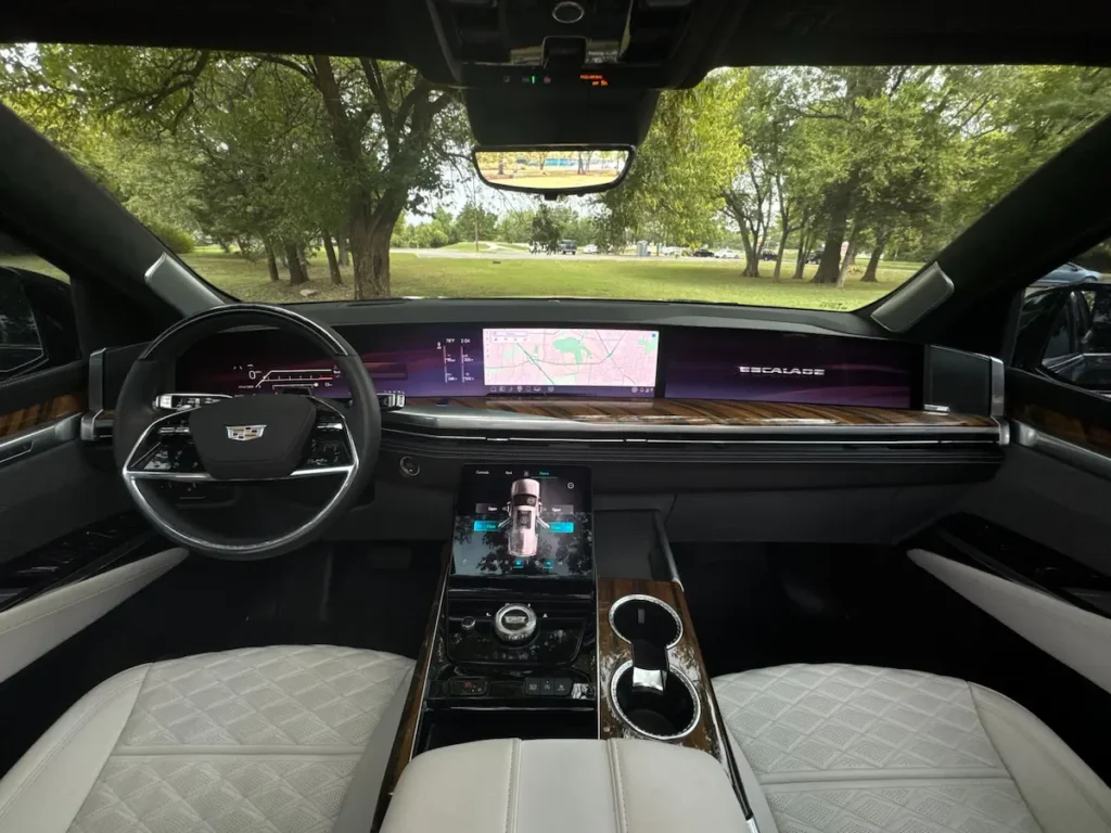2025 Cadillac Escalade front interior with OLED dashboard, digital displays, and premium materials.