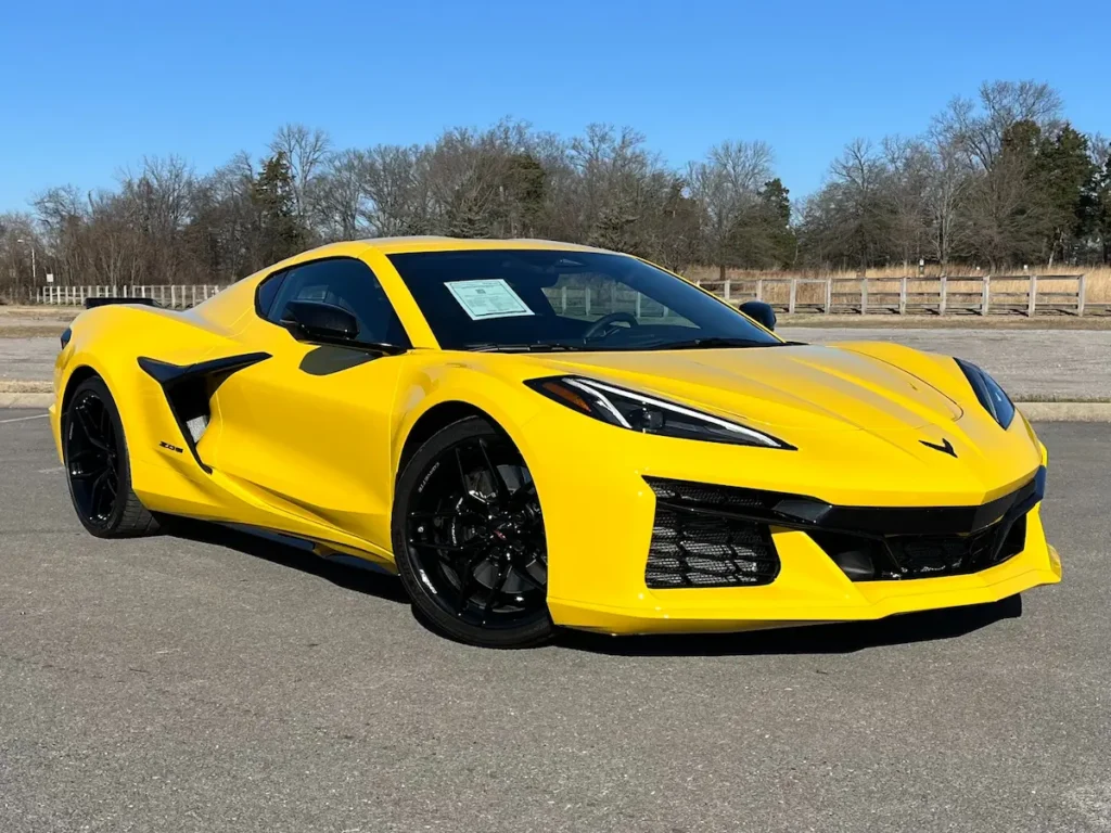 Front three-quarter view of a yellow Chevrolet Corvette Z06 showing aggressive front design