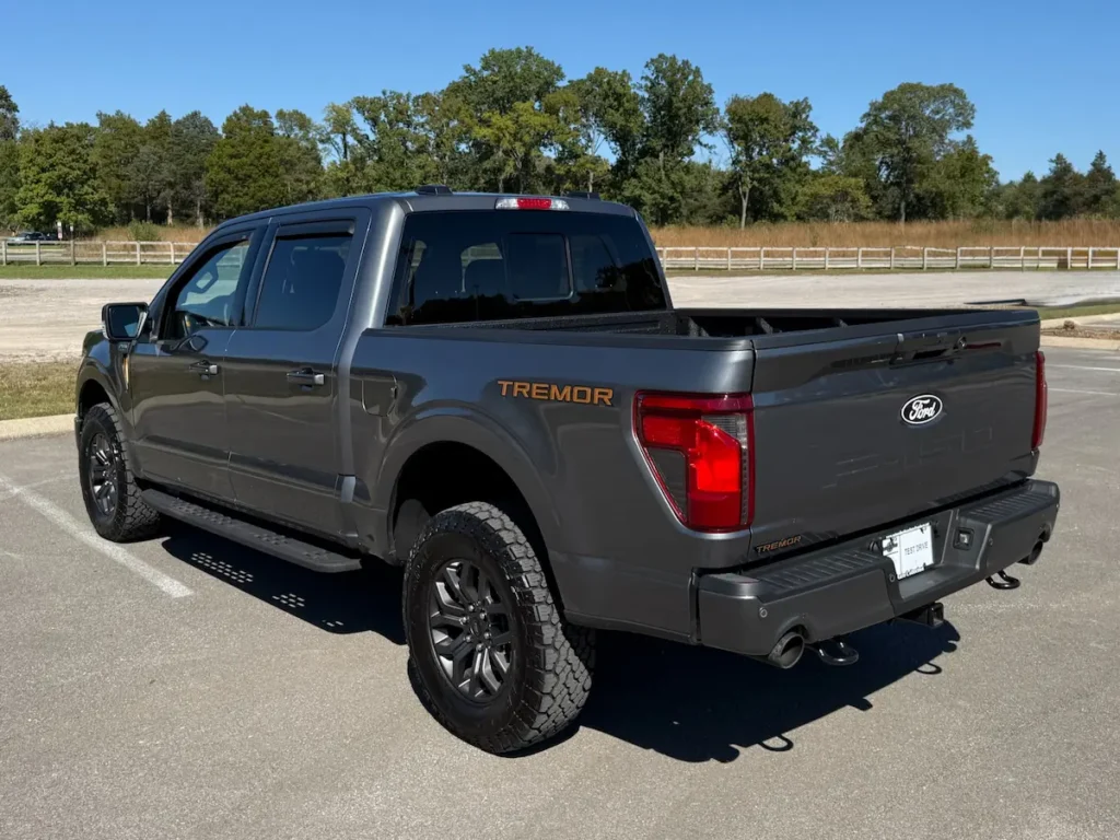 Rear view of used 2025 Ford F-150 Tremor gray truck