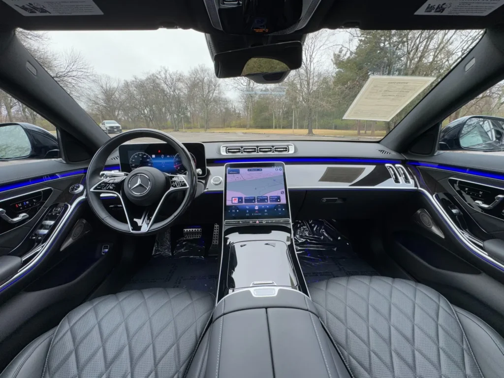 Interior of the 2024 Mercedes-Benz S580 4MATIC with AMG Line and Night Package, featuring quilted leather seats and advanced digital displays.